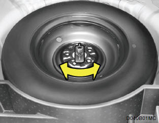Remove the installation bolt to remove the spare tire. To replace the spare tire