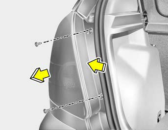 4. Detach the rear combination lamp by pulling it out (4 Door) or remove the