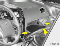 2. Lower the glove box down completely by