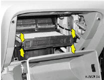 3. Remove the climate control air filter cover by
