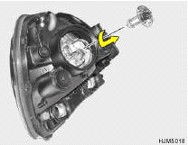 8. Push the bulb spring to remove the headlight