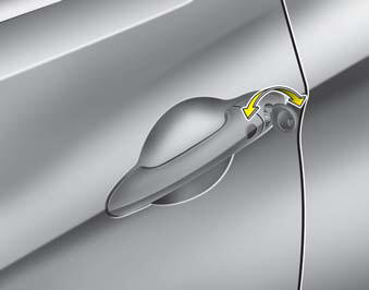  Turn the key toward the rear of the vehicle to unlock and toward the front